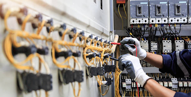 Professional Electrician technician working in Van Vleck, TX
